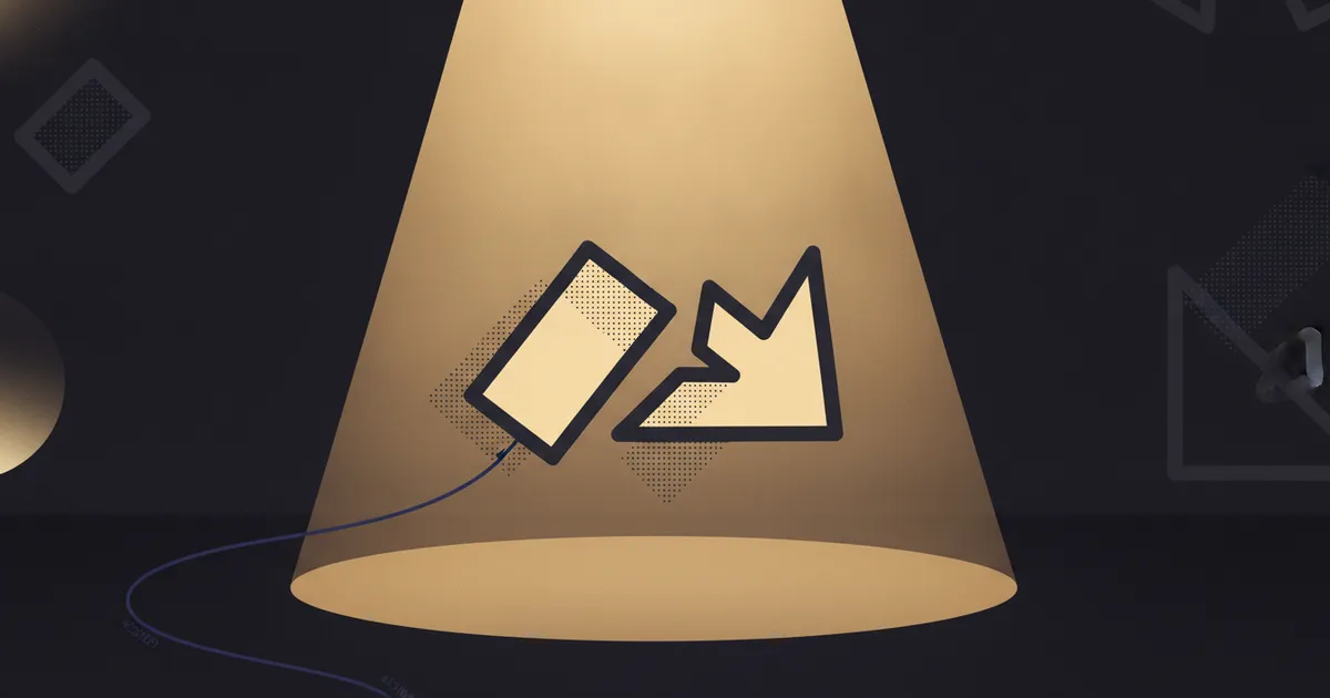 geometric forms in a warm spotlight pool on a dark stage
