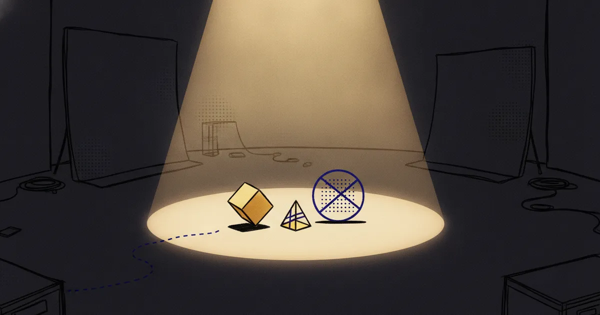 geometric forms in a warm spotlight pool on a dark stage